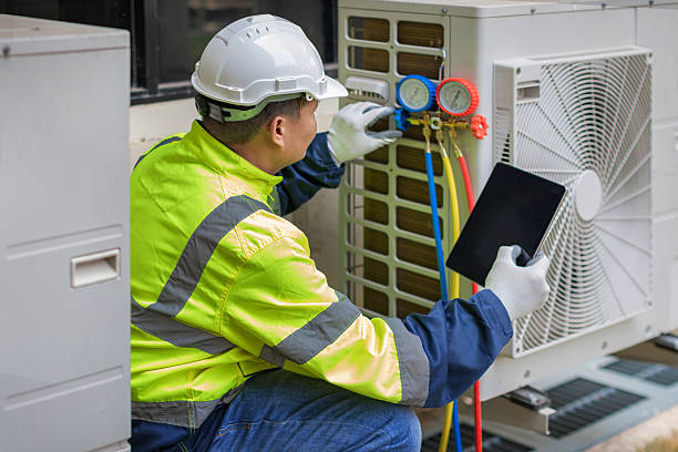 Professional Air Conditioning Repair technician working in Macomb, MI